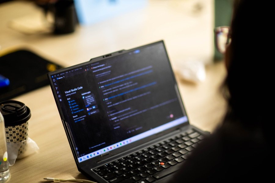 A laptop running Visual Studio Code during a Weekend Startup Lab session
